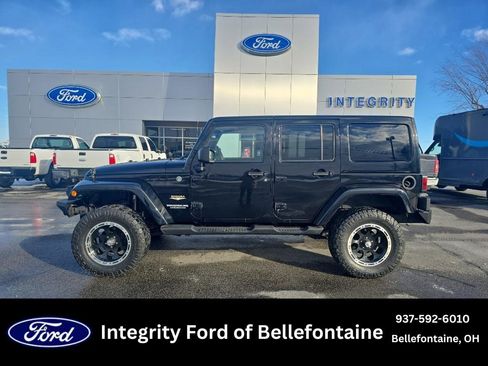 Used 2012 Jeep Wrangler Unlimited Sahara w/ Dual Top Group image 1