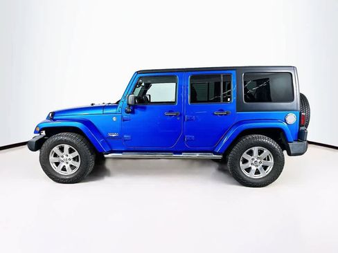 Used 2015 Jeep Wrangler Unlimited Sahara w/ Dual Top Group AWD/4WD image 3