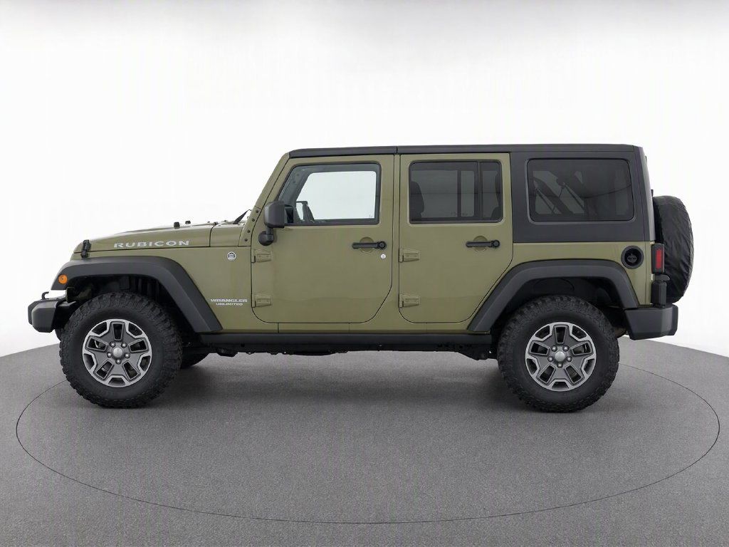 Used 2013 Jeep Wrangler Unlimited Rubicon w/ Dual Top Group AWD/4WD image 5