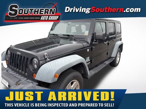 Used 2012 Jeep Wrangler Unlimited Sport AWD/4WD image 1