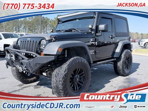 Used 2013 Jeep Wrangler Sport image 1