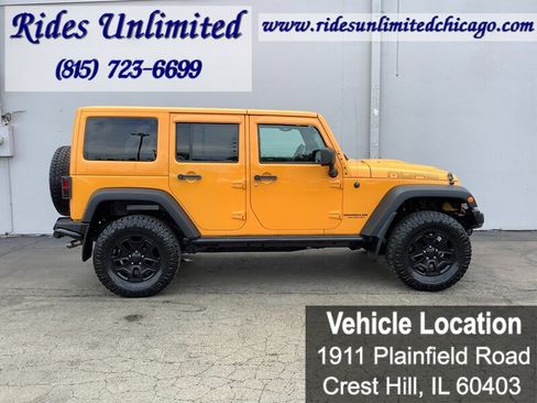 Used 2013 Jeep Wrangler Unlimited Sahara w/ Dual Top Group AWD/4WD image 7