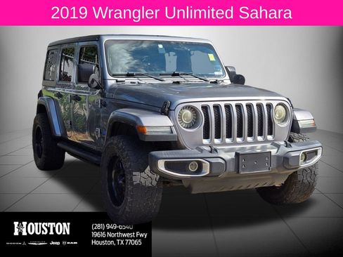 Used 2019 Jeep Wrangler Unlimited Sahara AWD/4WD image 1