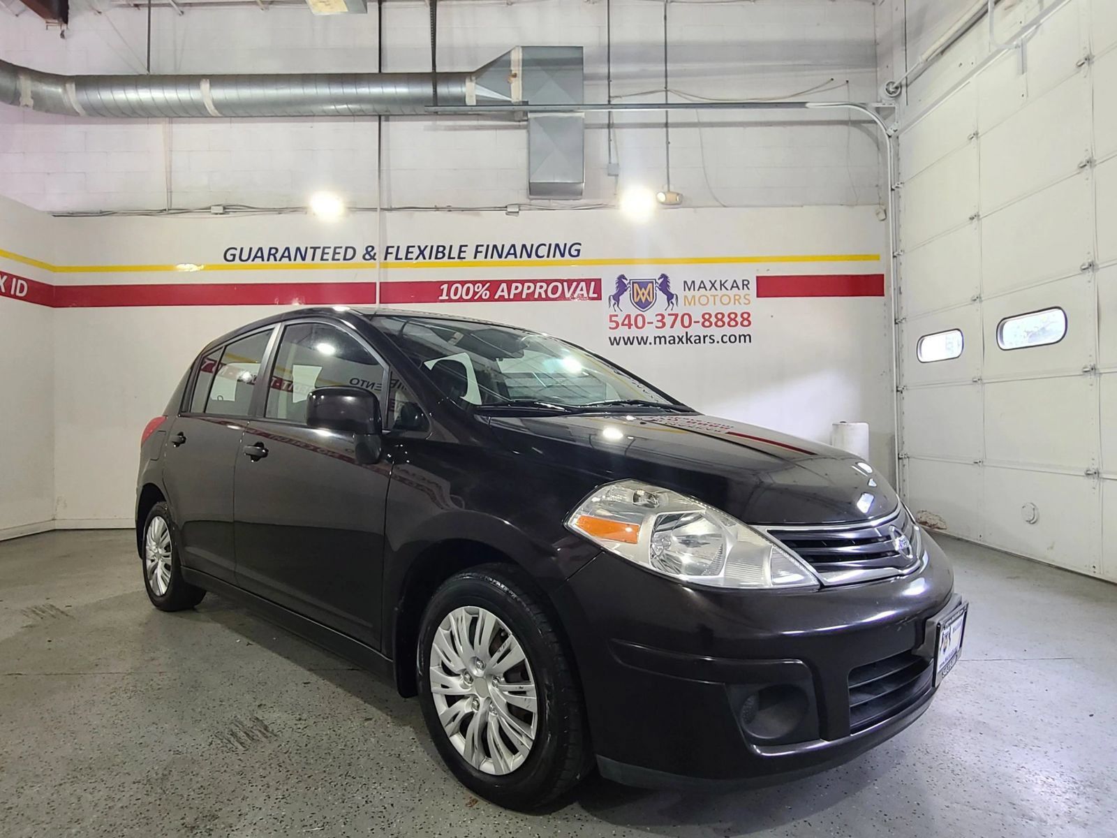Used 2012 Nissan Versa 1.8 S w/ Plus Pkg FWD image 1