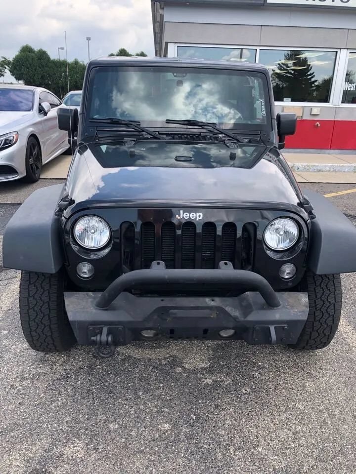 Used 2015 Jeep Wrangler Unlimited Sport w/ Mopar Black Appearance Group AWD/4WD image 2