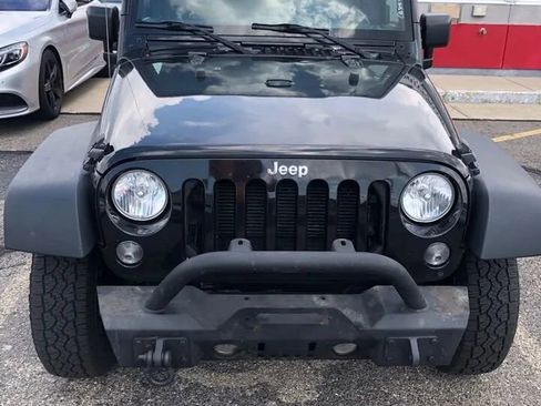 Used 2015 Jeep Wrangler Unlimited Sport w/ Mopar Black Appearance Group image 2