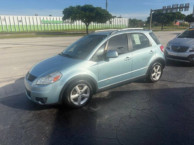 Used 2009 Suzuki SX4 AWD Hatchback w/ Touring Pkg image 1