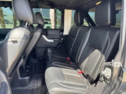 Used 2015 Jeep Wrangler Unlimited Sahara w/ Dual Top Group AWD/4WD image 10