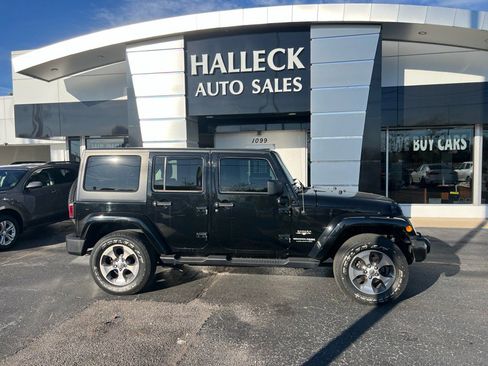 Used 2018 Jeep Wrangler Unlimited Sahara w/ Dual Top Group image 1