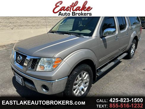 Used 2009 Nissan Frontier LE w/ LE Value Truck Pkg AWD/4WD image 1