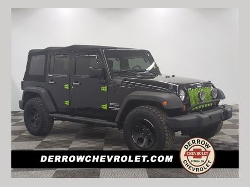 Used 2012 Jeep Wrangler Unlimited Sport AWD/4WD image 1