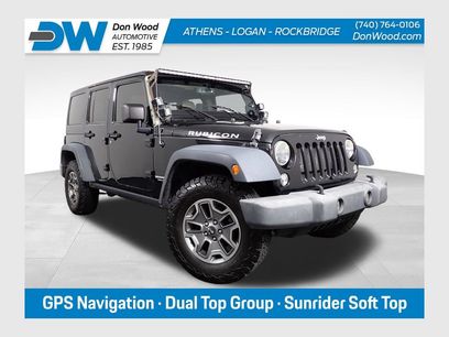Used 2014 Jeep Wrangler Unlimited Rubicon w/ Dual Top Group