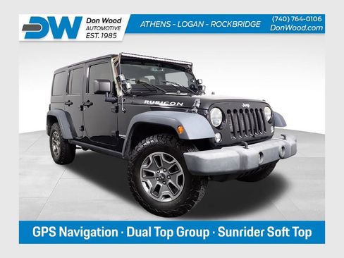 Used 2014 Jeep Wrangler Unlimited Rubicon w/ Dual Top Group AWD/4WD image 1