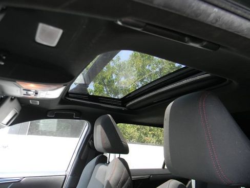 Used 2021 Toyota RAV4 SE w/ Weather & Moonroof Package AWD/4WD image 9