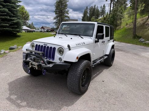 Used 2015 Jeep Wrangler Unlimited Sahara w/ Connectivity Group AWD/4WD image 1