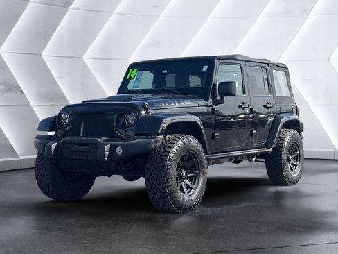 Used 2013 Jeep Wrangler Unlimited Sahara image 1