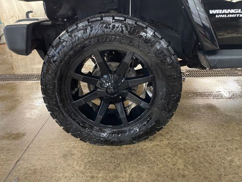 Used 2013 Jeep Wrangler Unlimited Sahara w/ Dual Top Group image 25