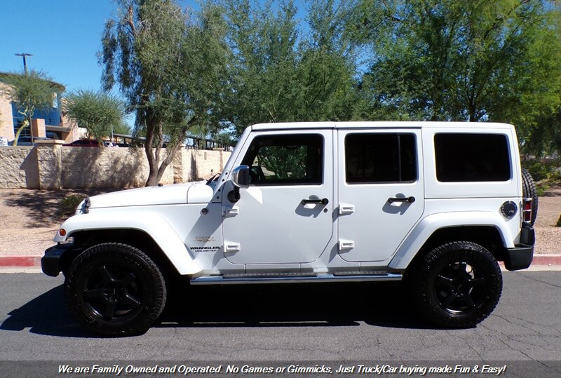 Used 2012 Jeep Wrangler Unlimited Sahara w/ Dual Top Group AWD/4WD image 5