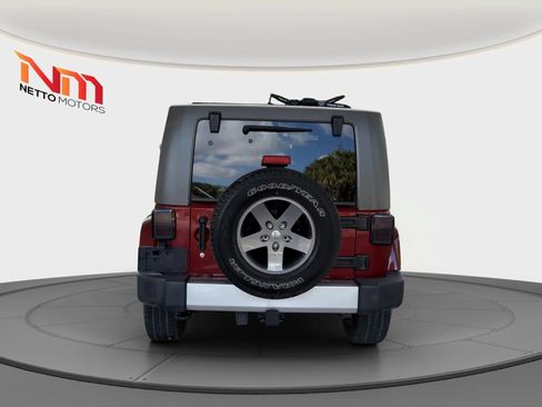 Used 2010 Jeep Wrangler Unlimited Sahara w/ Dual Top Group AWD/4WD image 4