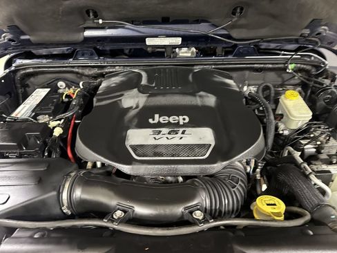 Used 2013 Jeep Wrangler Unlimited Sahara w/ Dual Top Group AWD/4WD image 22