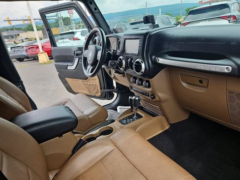 Used 2012 Jeep Wrangler Unlimited Sahara w/ Dual Top Group AWD/4WD image 17