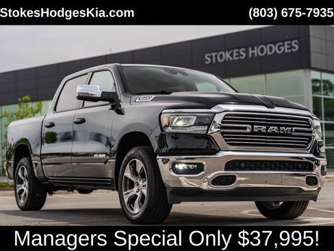 Used 2023 RAM 1500 Laramie AWD/4WD image 1