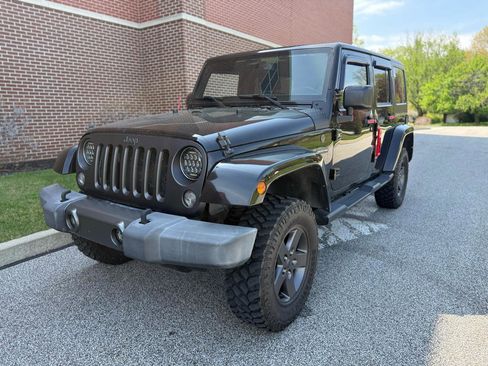 Used 2016 Jeep Wrangler Unlimited Sport AWD/4WD image 1
