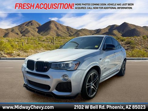 Used 2016 BMW X4 xDrive35i AWD/4WD image 1