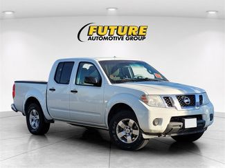 Used 2013 Nissan Frontier SV image 1