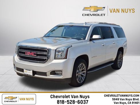 Used 2017 GMC Yukon XL SLT w/ Open Road Package AWD/4WD image 1