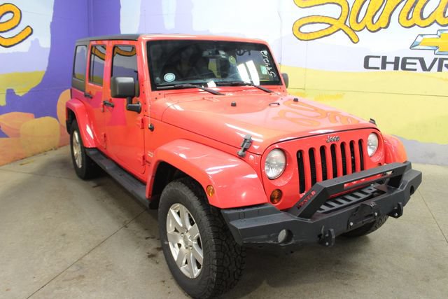 Used 2013 Jeep Wrangler Unlimited Sahara w/ Dual Top Group AWD/4WD image 2