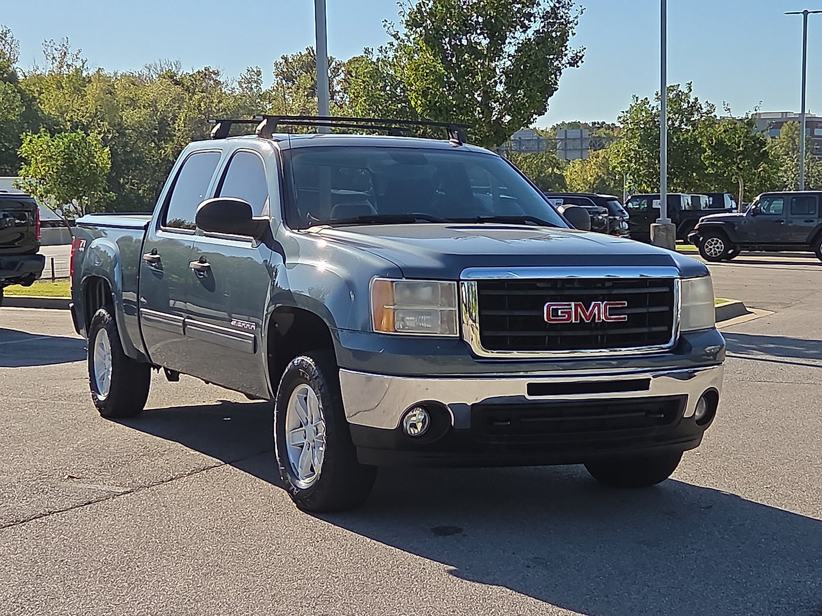 Used 2011 GMC Sierra 1500 SLE w/ Power Tech Package AWD/4WD image 1