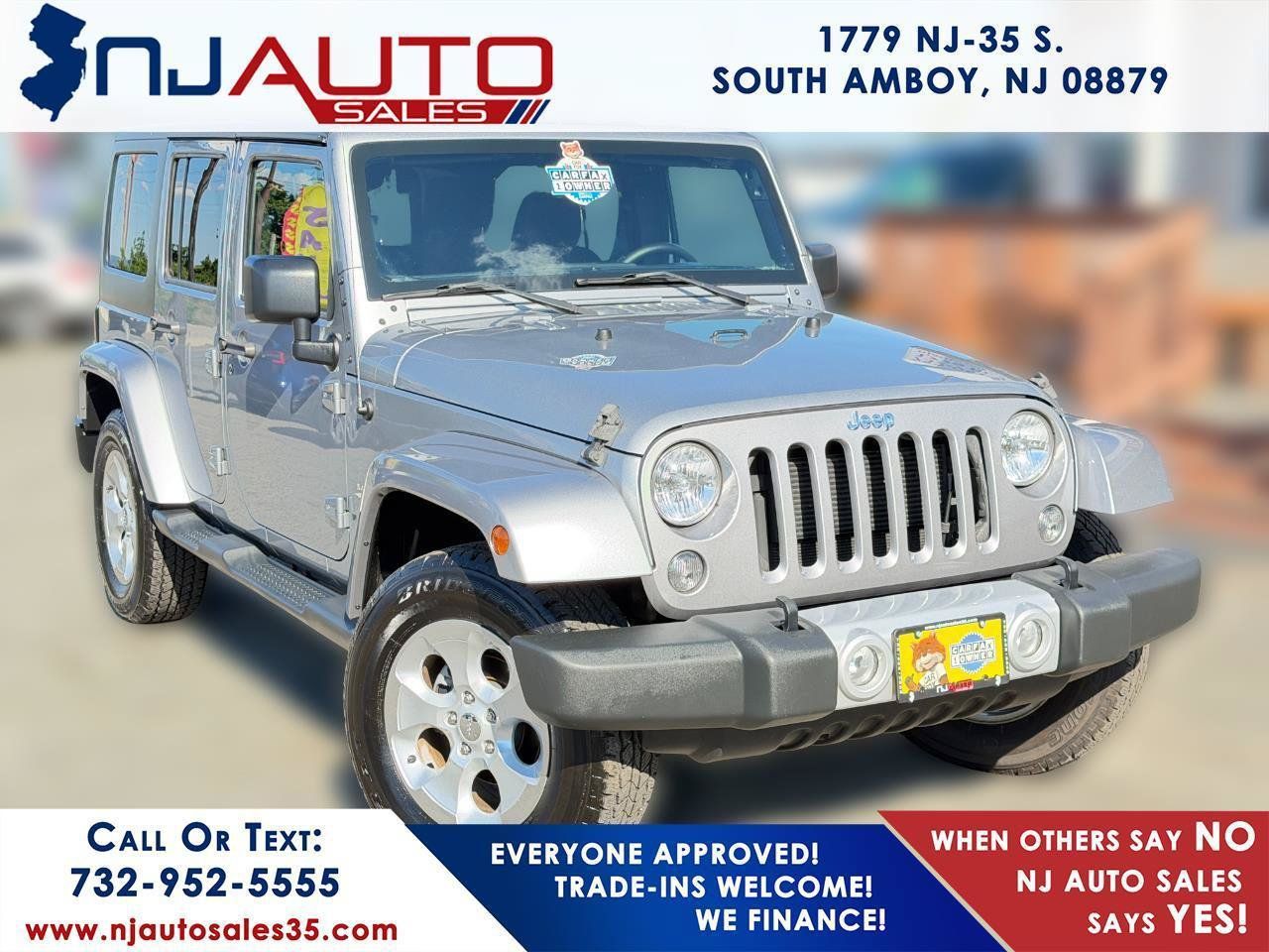 Used 2015 Jeep Wrangler Unlimited Sahara w/ Dual Top Group AWD/4WD image 1