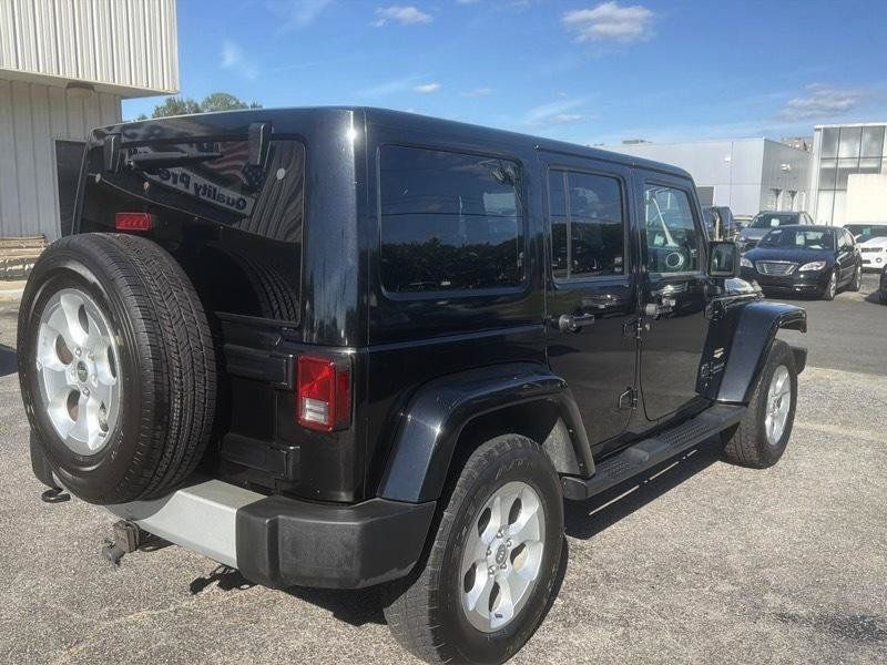Used 2014 Jeep Wrangler Unlimited Sahara w/ Dual Top Group AWD/4WD image 8