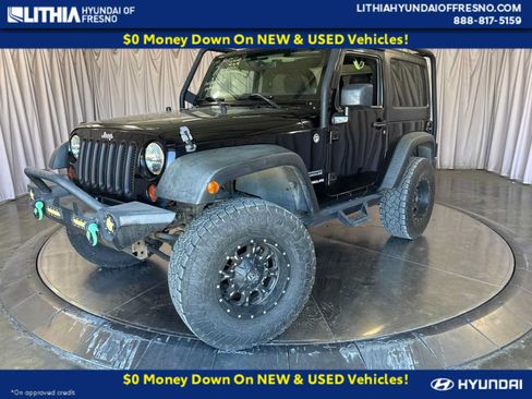Used 2012 Jeep Wrangler Sport AWD/4WD image 1