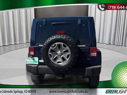 Used 2013 Jeep Wrangler Unlimited Rubicon w/ Dual Top Group AWD/4WD image 4
