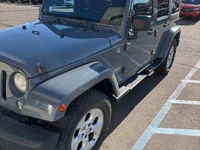 Used 2014 Jeep Wrangler Unlimited Sahara w/ Dual Top Group