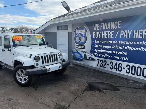 Used 2016 Jeep Wrangler Unlimited Sahara w/ Dual Top Group image 1