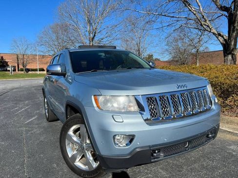 Used 2013 Jeep Grand Cherokee Overland Summit AWD/4WD image 1