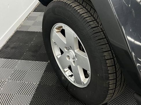 Used 2010 Jeep Wrangler Unlimited Sahara w/ Dual Top Group image 9