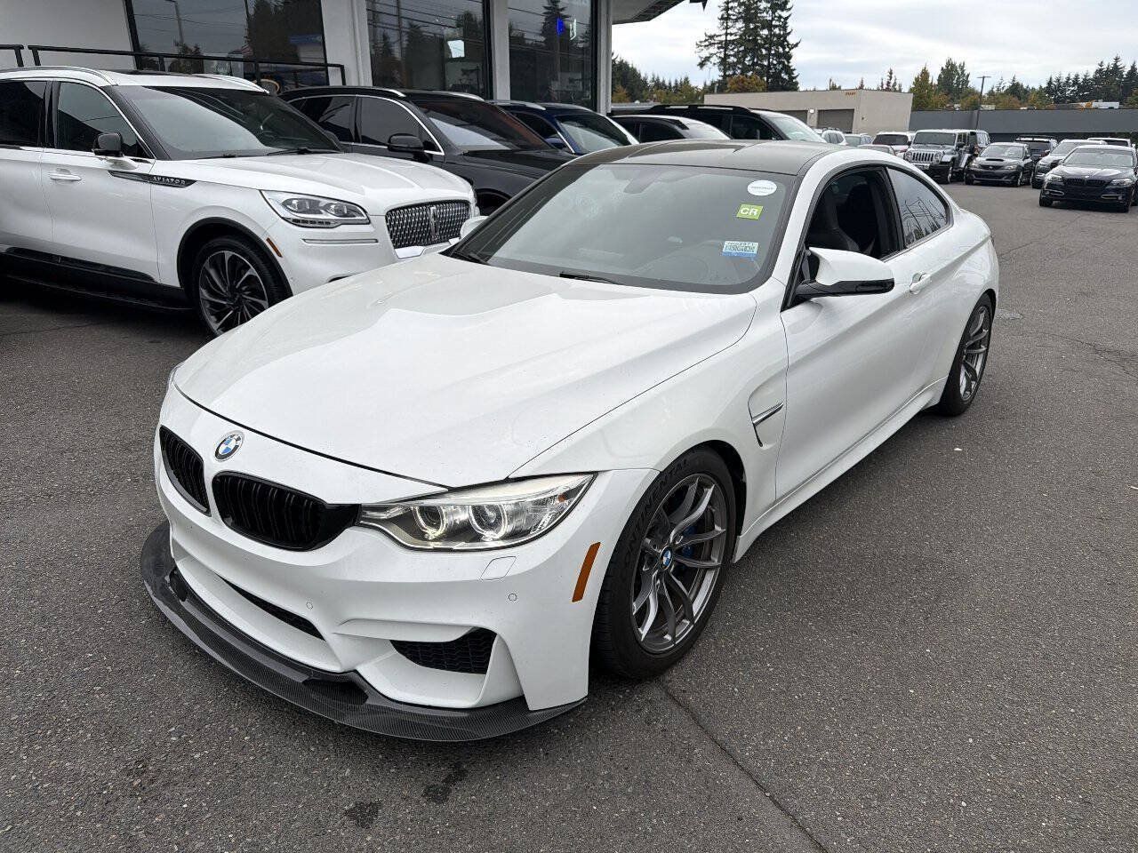 Used 2015 BMW M4 Coupe w/ Executive Package RWD image 1
