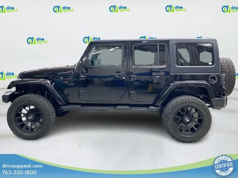 Used 2014 Jeep Wrangler Unlimited Sahara w/ Dual Top Group AWD/4WD image 9