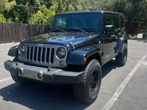 Used 2015 Jeep Wrangler Unlimited Sport AWD/4WD image 1