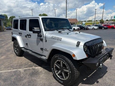 Used 2012 Jeep Wrangler Unlimited Sahara AWD/4WD image 1