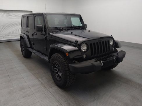 Used 2014 Jeep Wrangler Unlimited Sahara AWD/4WD image 13