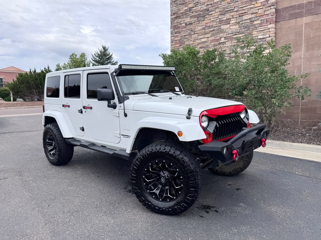 Used 2012 Jeep Wrangler Unlimited Sahara w/ Connectivity Group AWD/4WD image 2
