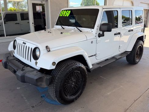 Used 2013 Jeep Wrangler Unlimited Sahara w/ Dual Top Group AWD/4WD image 3