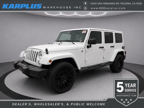 Used 2014 Jeep Wrangler Unlimited Sahara w/ Dual Top Group AWD/4WD image 1