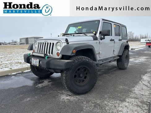 Used 2012 Jeep Wrangler Unlimited Sport image 1