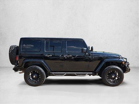 Used 2012 Jeep Wrangler Unlimited Rubicon w/ Dual Top Group AWD/4WD image 4